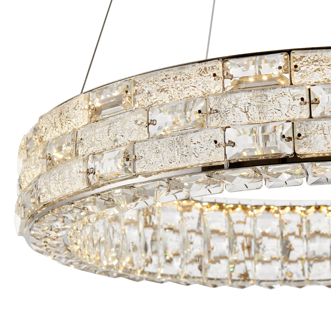 Crystal chandelier with multiple tiers on a white background