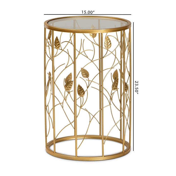 Gold leaf-patterned side table with dimensions on a white background
