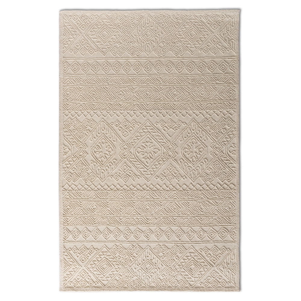 Beige patterned rug on a white background