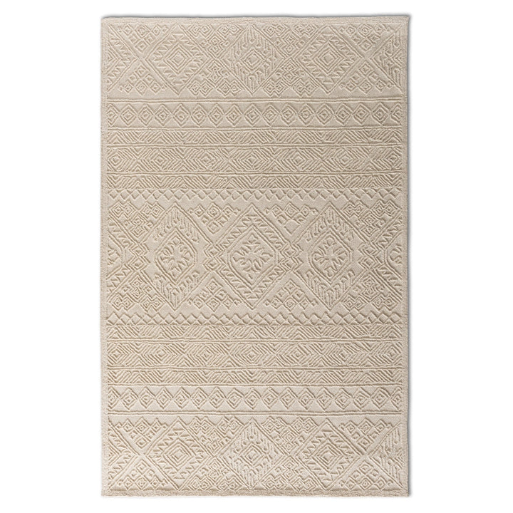 Beige patterned rug on a white background