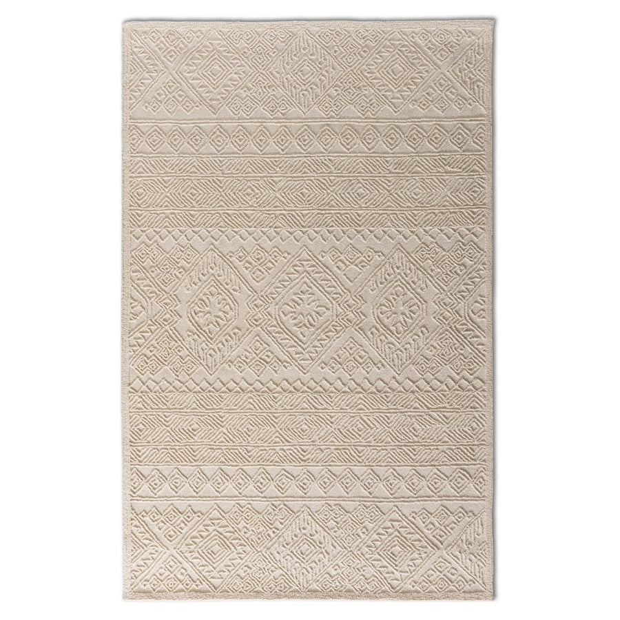 Beige patterned rug on a white background
