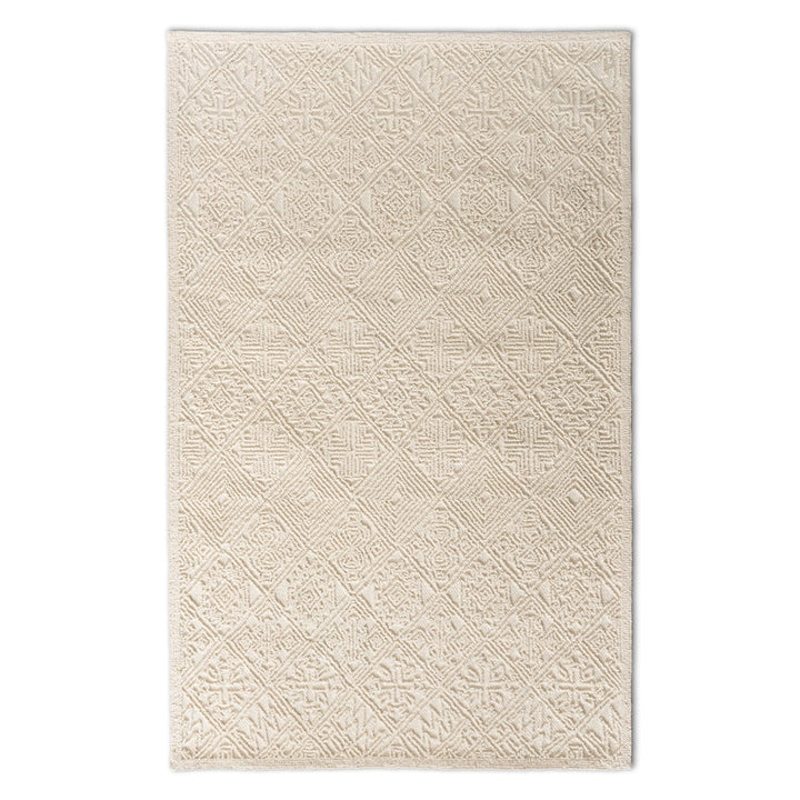 Beige patterned rug on a white background