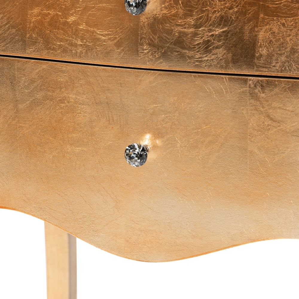 Close-up of a wooden drawer with a crystal handle on a white background
