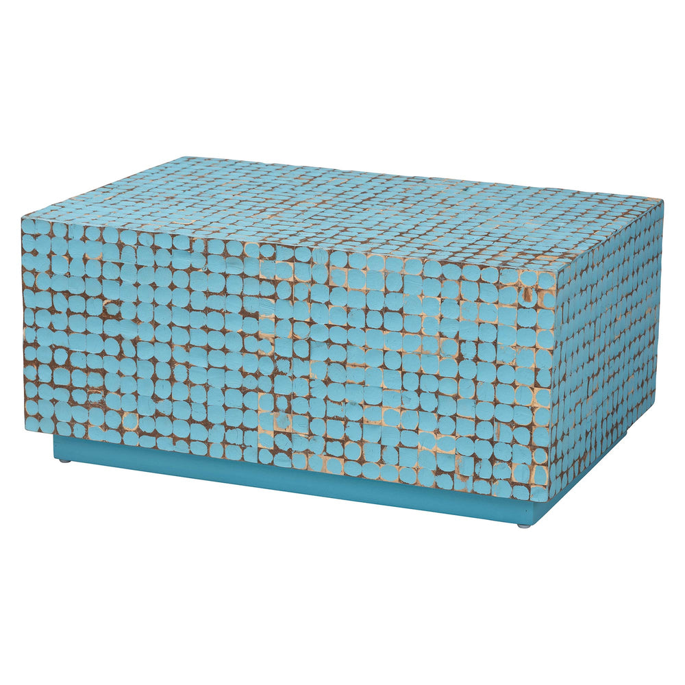 Blue mosaic patterned ottoman on a white background