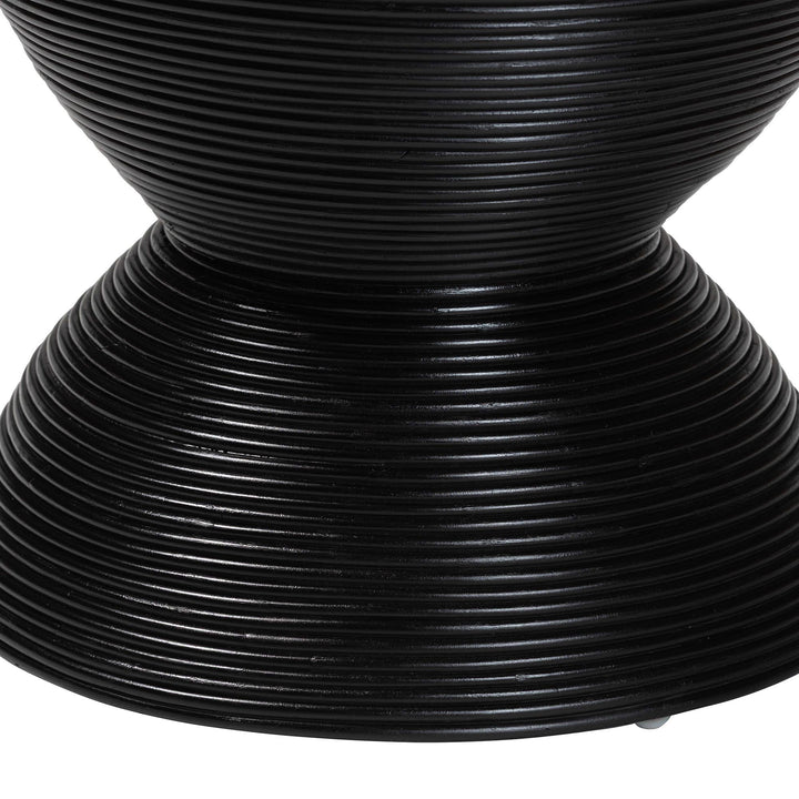 Close-up of a black woven chair seat on a white background
