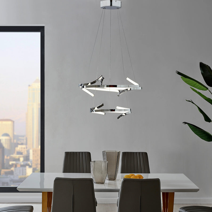 Modern chandelier hanging above a dining table with chairs in a room with a cityscape view. 