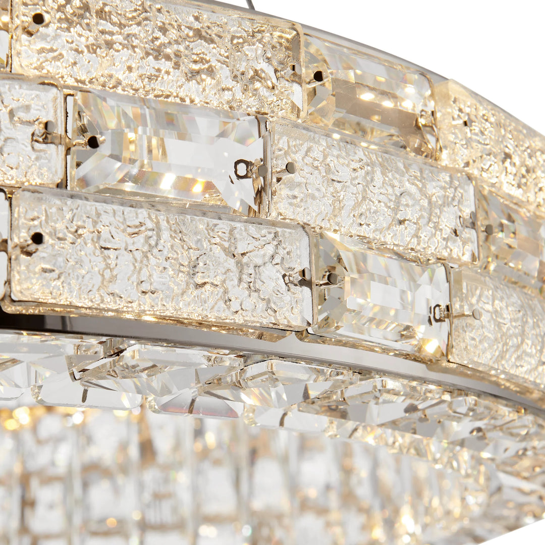 Close-up of a crystal chandelier with a blurred background