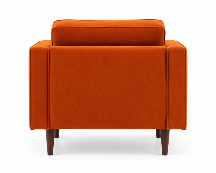 Bright orange upholstered armchair shown from the back, featuring a tall back cushion, wide armrests, and tapered dark brown wooden legs on a white background.