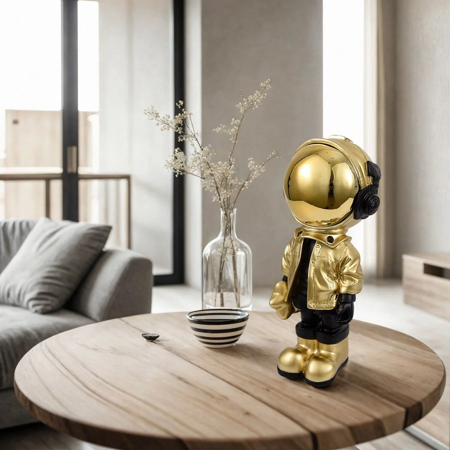 Gold astronaut figurine on a wooden table in a modern living room