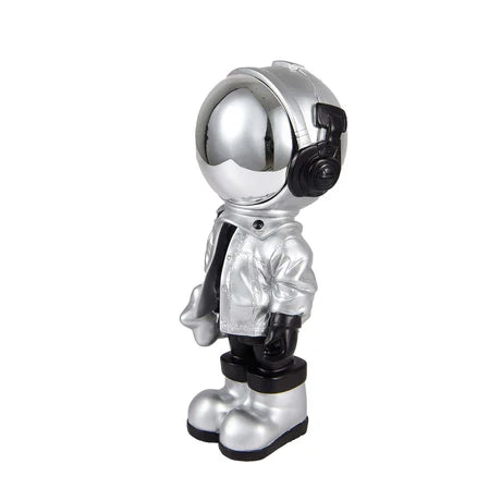 Metallic robot figurine on a white background