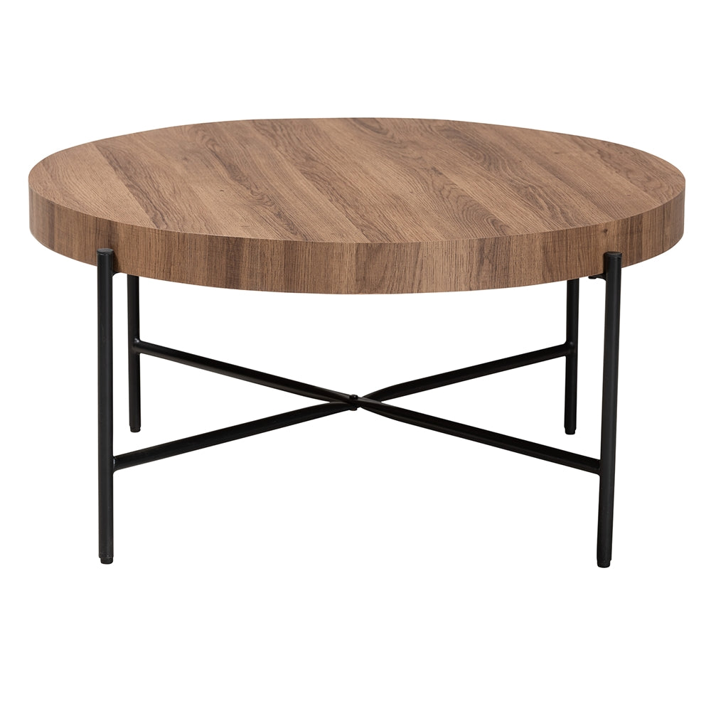 Round wooden coffee table with black metal legs on a white background