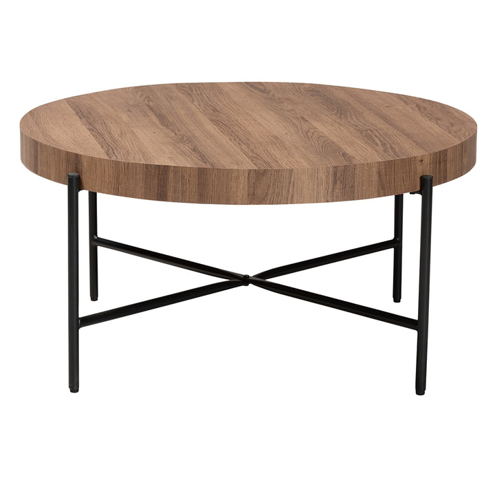 Round wooden coffee table with black metal legs on a white background