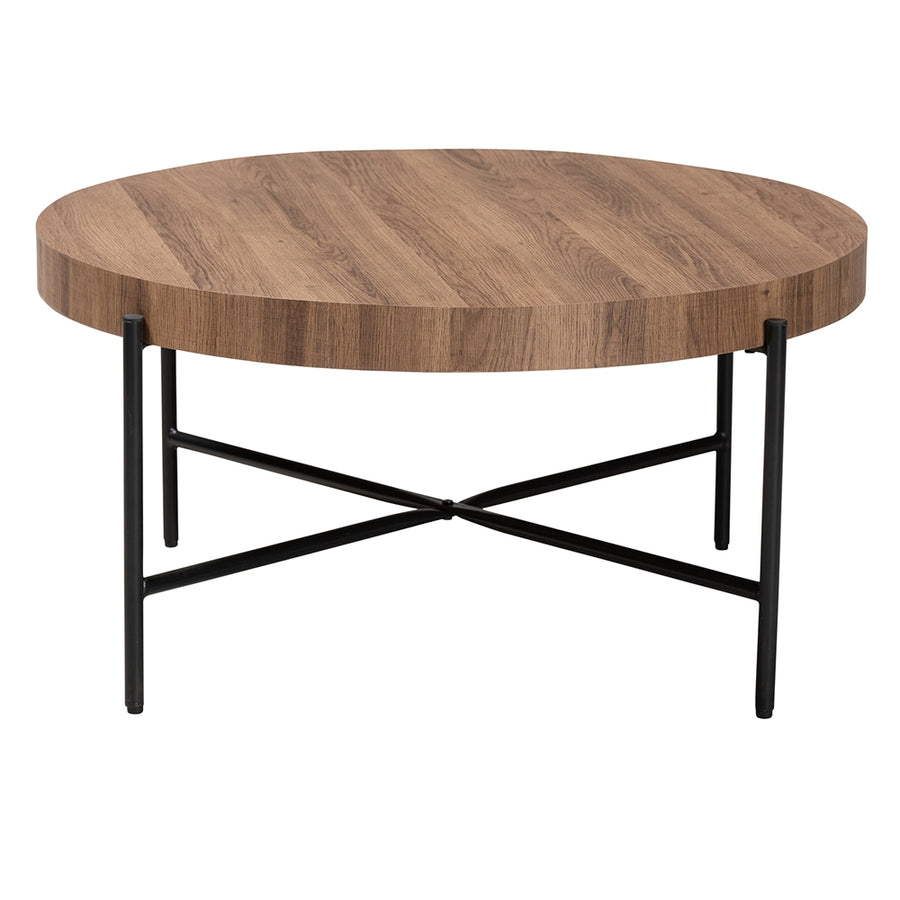 Round wooden coffee table with black metal legs on a white background
