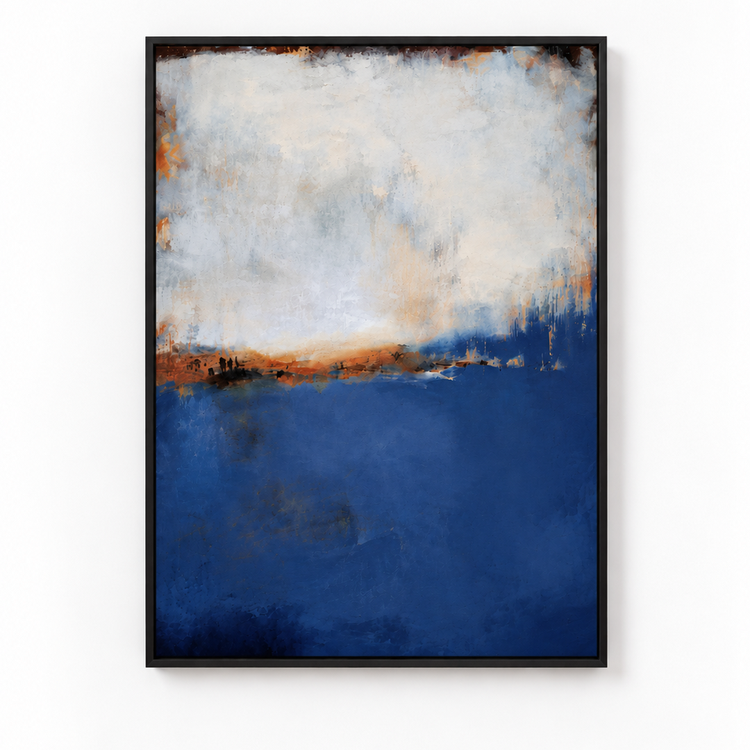 A framed abstract landscape art print featuring a deep blue lower section and a textured off-white and orange upper section, housed in a thin black frame against a plain white wall.
