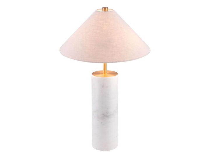 A modern table lamp featuring a white marble cylindrical base with subtle gray veining, a gold-finished metal stem, and a tapered off-white fabric shade that glows with a warm light.