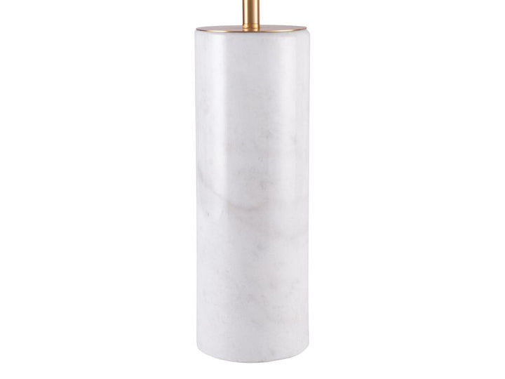 A modern cylindrical table lamp base made of white marble with subtle gray veining, topped with a polished gold-finished metal collar and stem. 