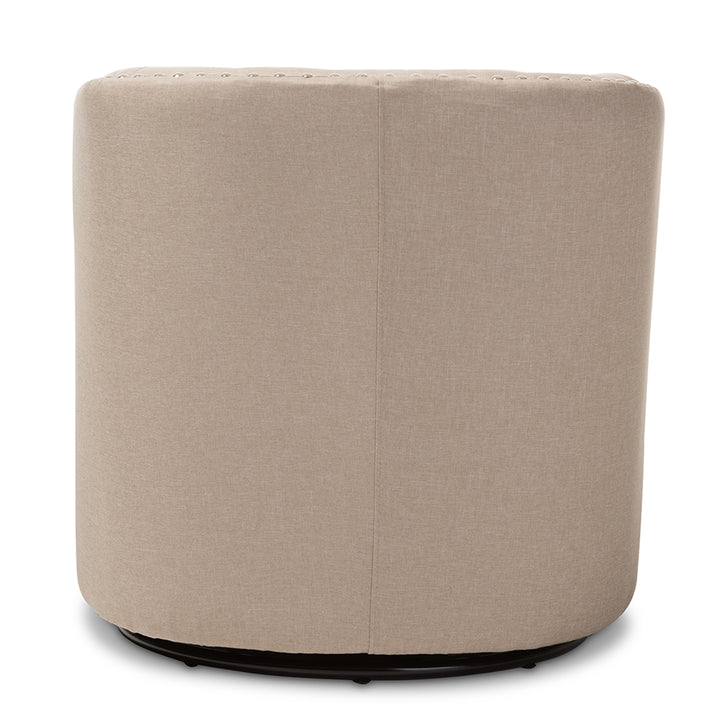 Round beige ottoman with a black base on a white background