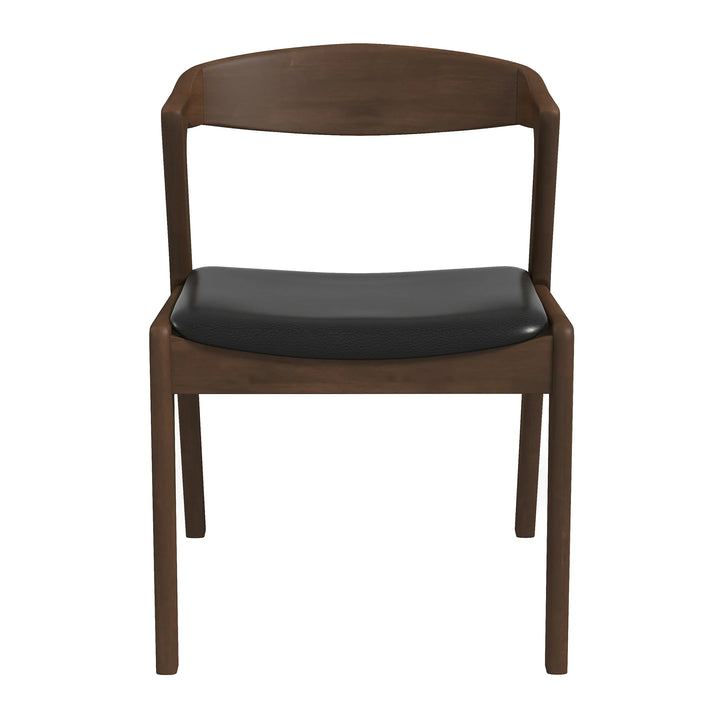 Brown wooden chair with black cushion on a white background