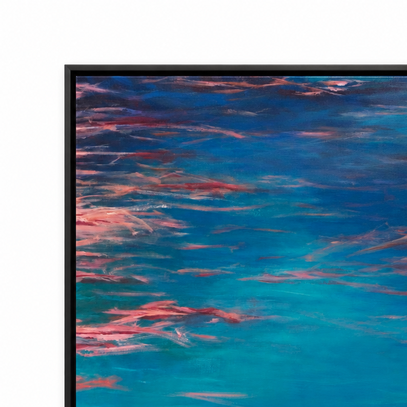 A framed abstract painting featuring textured brushstrokes of deep blue, turquoise, and pink, presented in a thin black frame against a clean white background.