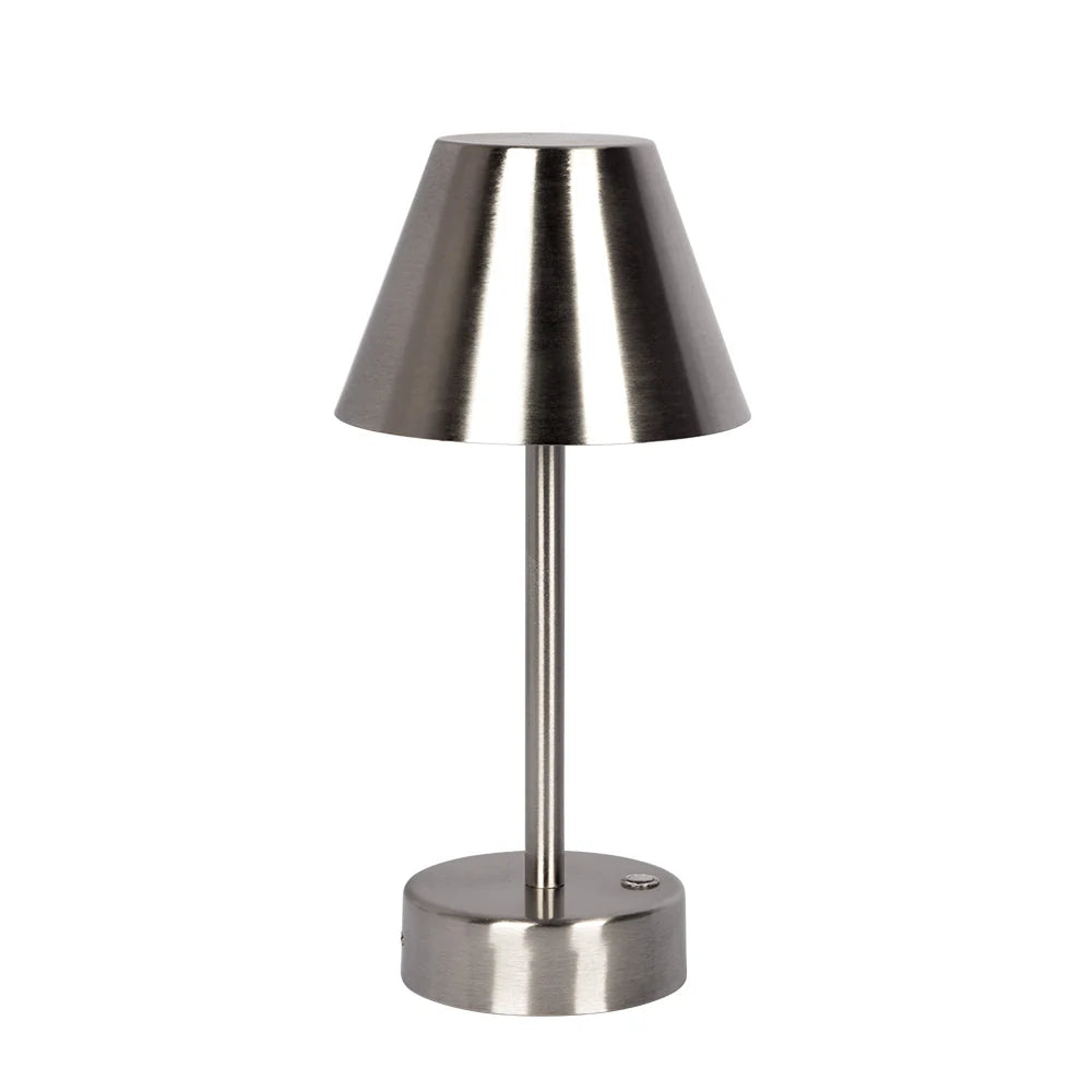 Metallic table lamp on a white background