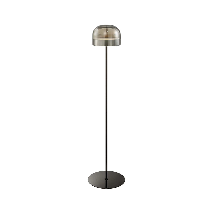Modern floor lamp with a metallic shade on a white background