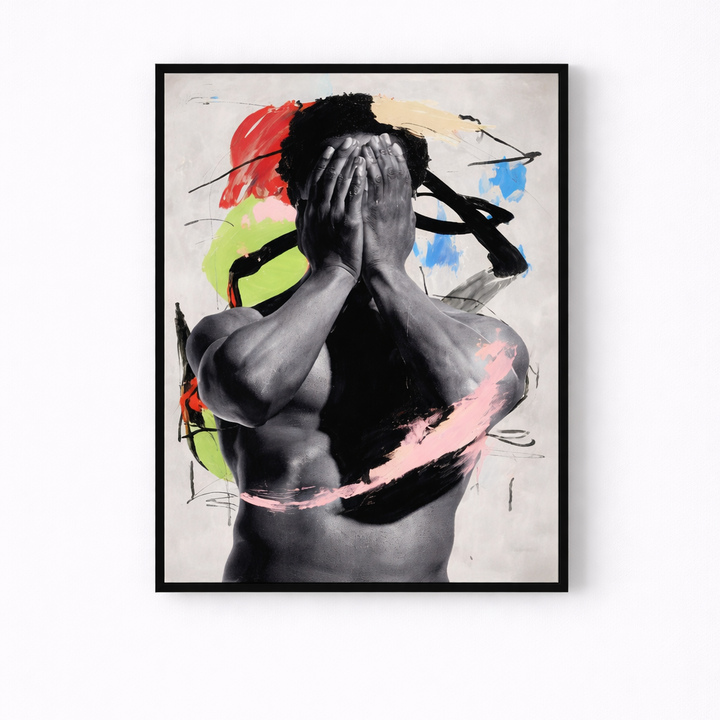 Framed abstract artwork with a nude figure and colorful abstract elements on a white wall.