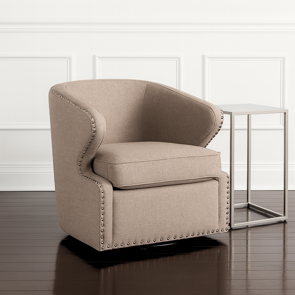 Crafted from the ground up, the Finley armchair was intentionally designed to reflect classical shapes, offering a comforting sense of the familiar while also challenging design concepts with its angular armrests, edge piping, and stylish grommet-style nail head trim. Featuring a swivel base, the Finley armchair is built with a solid wood frame and upholstered in beige polyester fabric. With a nod to mid-century retro modern design, this chair blends seamlessly with modern home décor. The swivel armchair re