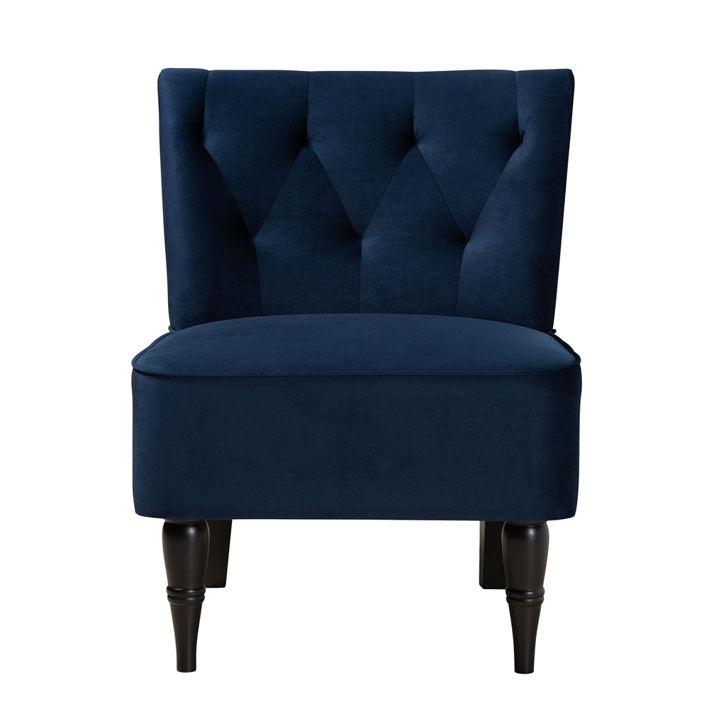 Navy blue tufted chair on a white background