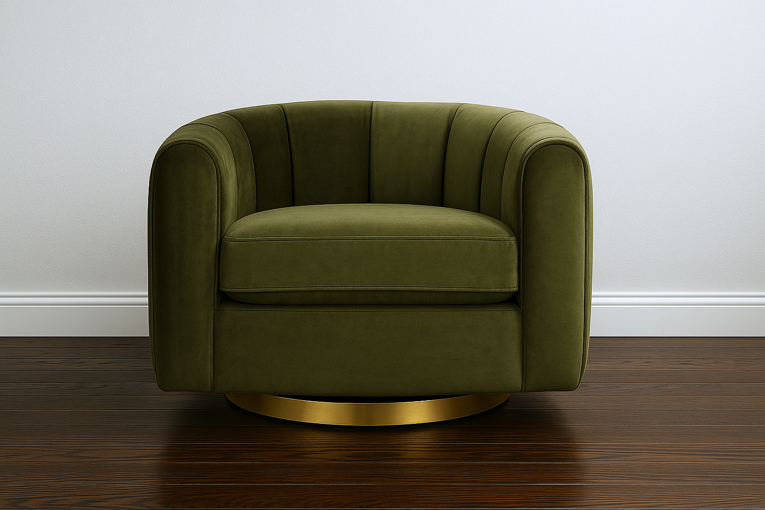 Green armchair with gold base on a wooden floor against a white wall