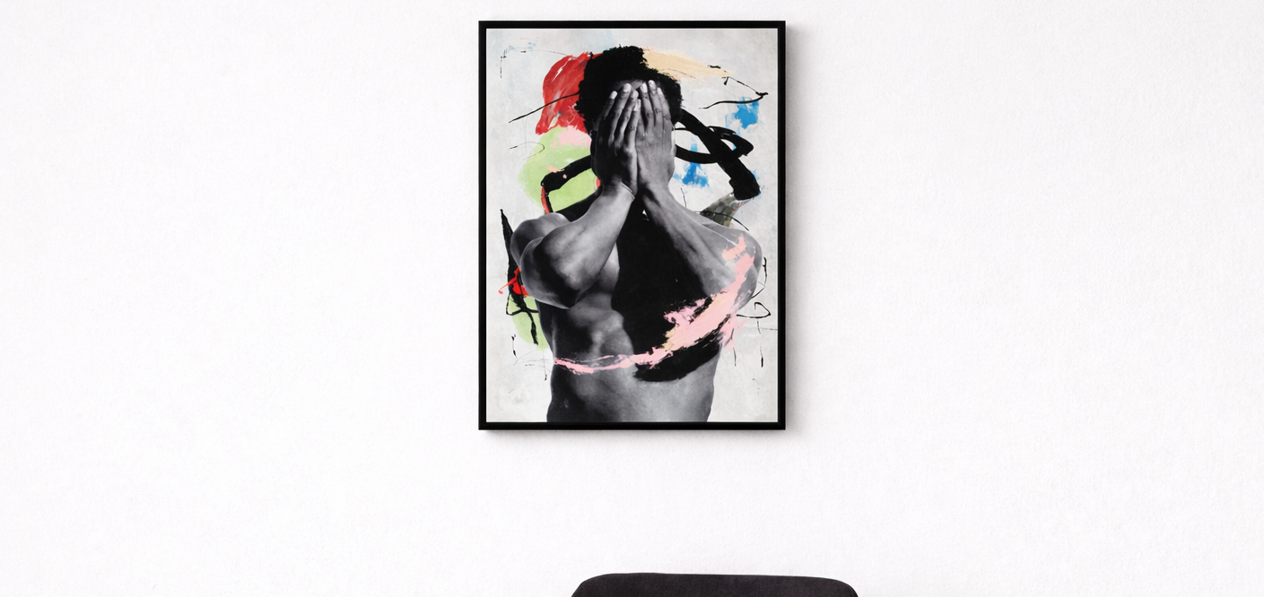 Framed artwork of a person with colorful abstract elements on a white wall.