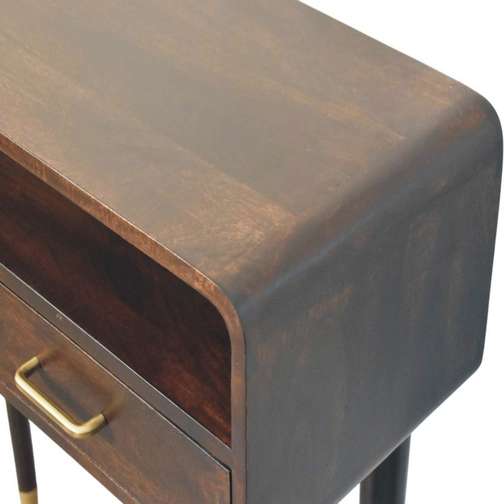 Wooden side table with a drawer and brass handle on a white background