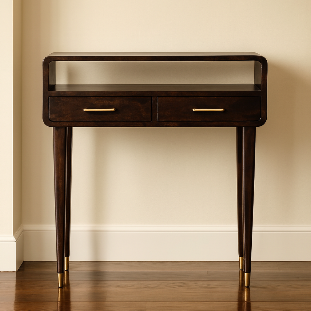 Wooden console table with two drawers and gold handles against a beige wall.