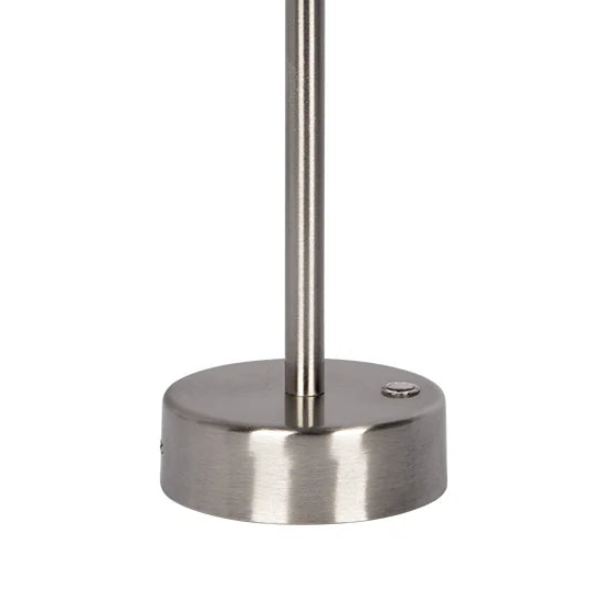 Metallic table lamp on a white background