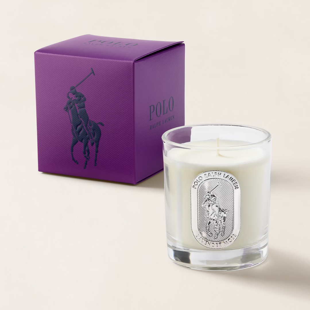 Polo Ralph Lauren candle with purple packaging on a light background