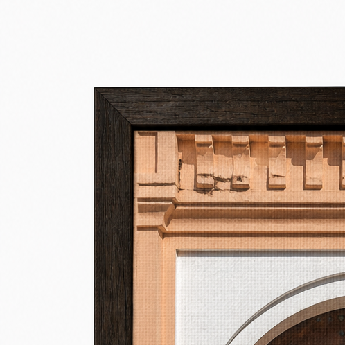 Framed photograph of a wooden door with an arched top and decorative archway on a white background