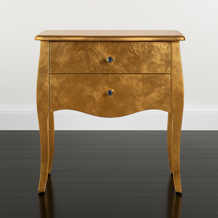 Wooden side table with two drawers on a dark wooden floor and light gray wall background