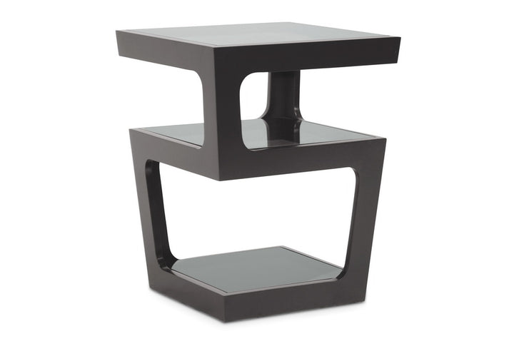 Modern black side table with glass top on a white background