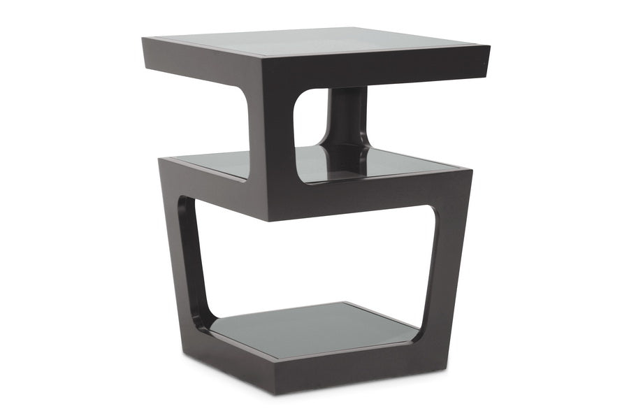 Modern black side table with glass top on a white background