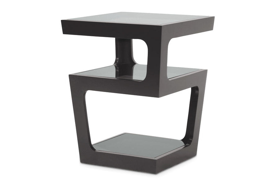 Modern black side table with glass top on a white background