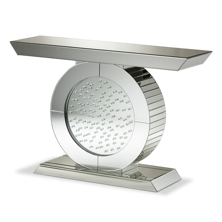Decorative console table with circular design and reflective surface on a white background