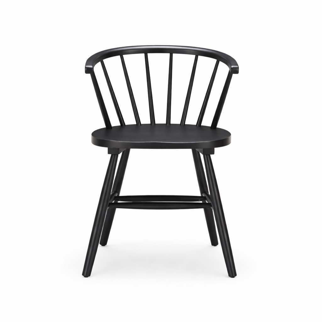 Designed for both style and functionality, the Stenger Dining Chair in Black is crafted from painted rubberwood and inspired by the classic 18th-century Windsor chair. Originating in England, Windsor designs are known for their sculpted seats, spindle backs, and angled legs for strength and comfort.&nbsp;