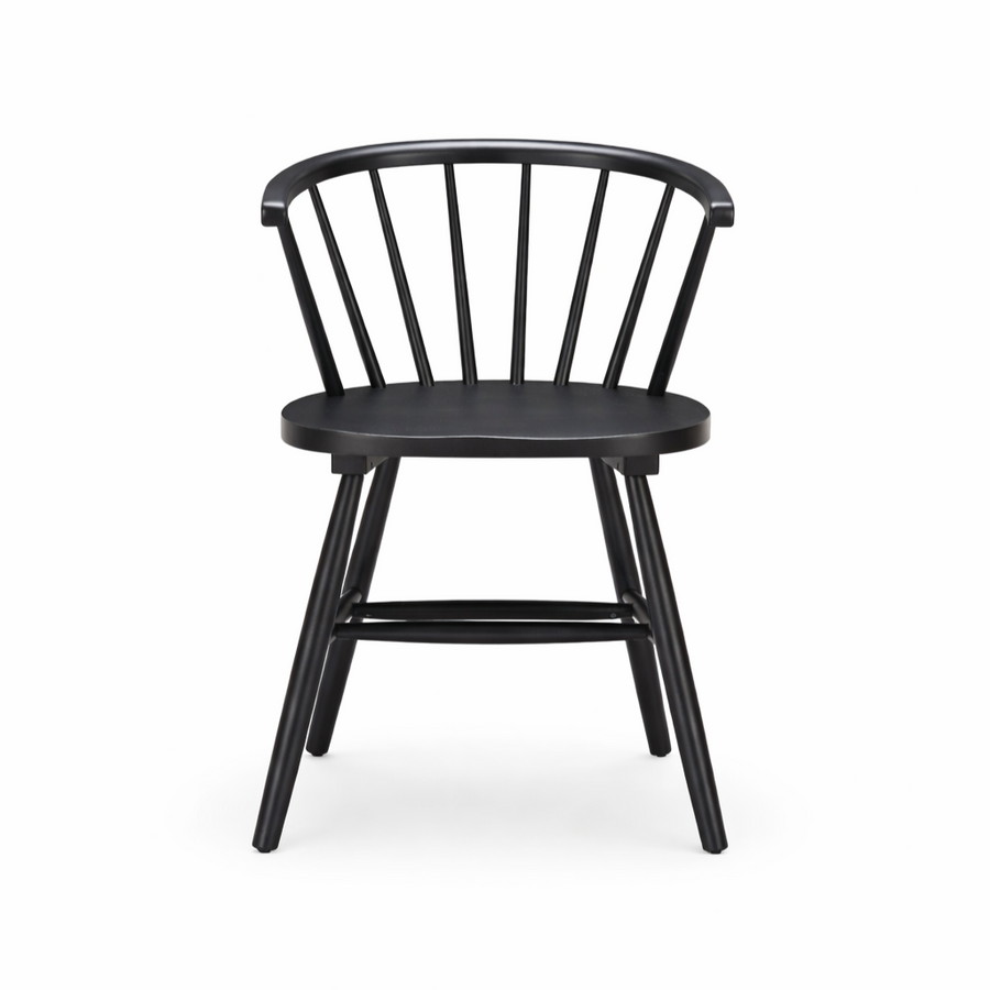 Designed for both style and functionality, the Stenger Dining Chair in Black is crafted from painted rubberwood and inspired by the classic 18th-century Windsor chair. Originating in England, Windsor designs are known for their sculpted seats, spindle backs, and angled legs for strength and comfort.&nbsp;