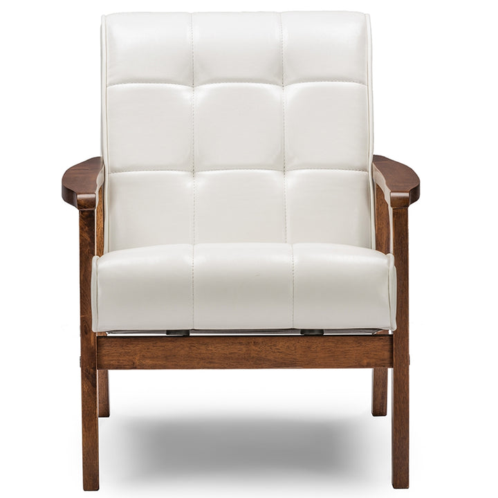 White upholstered armchair with wooden frame on a white background