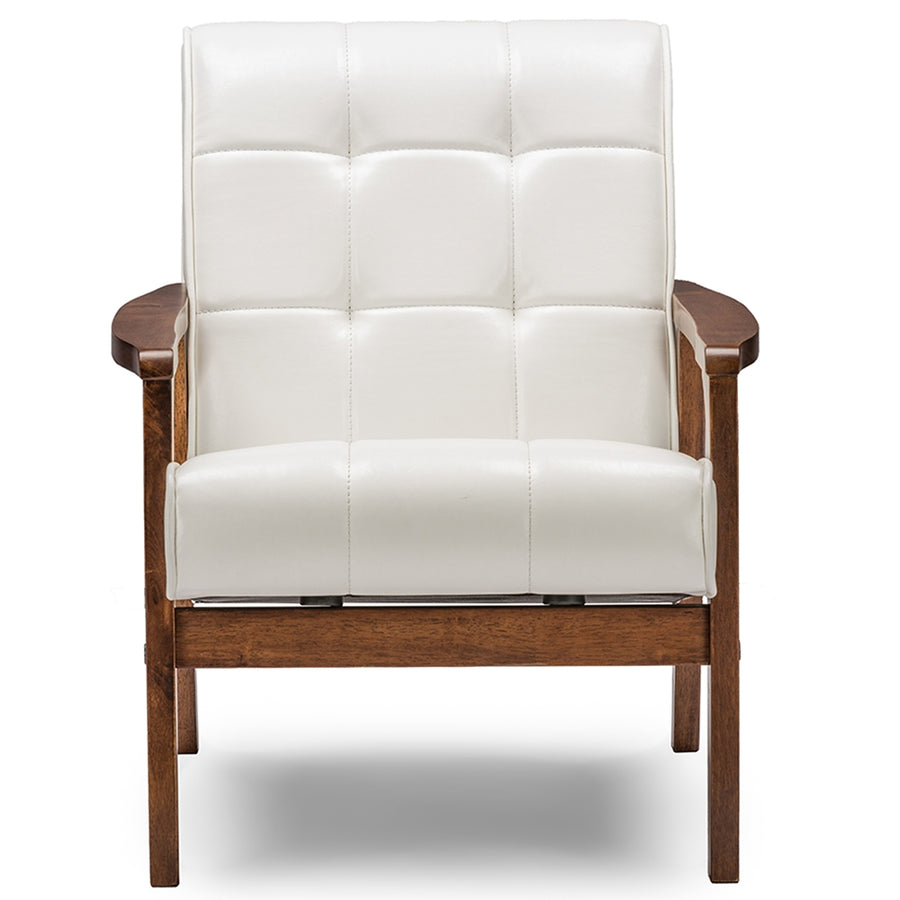 White upholstered armchair with wooden frame on a white background