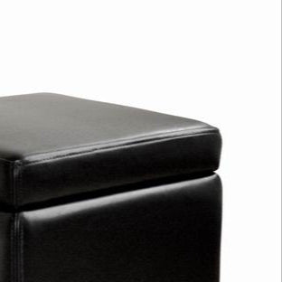 Black leather storage ottoman on a white background