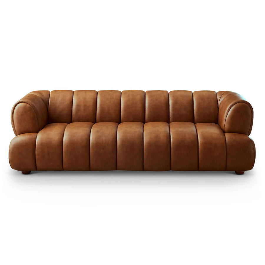 Brown leather sofa on a white background. Experience exquisite craftsmanship and design with the Jasmin Sofa (Cognac Leather), a refined centerpiece crafted for modern homes. Made from premium top-grain cowhide leather, this sofa features rich cognac tones with a protective pigmented finish for long-lasting color and exceptional wear resistance.