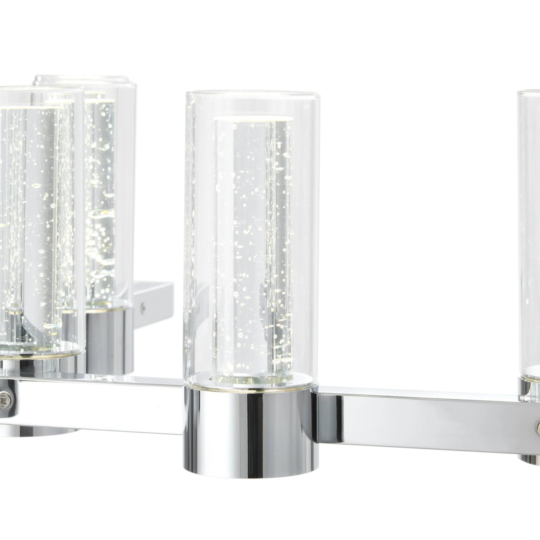 Chrome wall-mounted light fixture with clear glass shades on a white background 