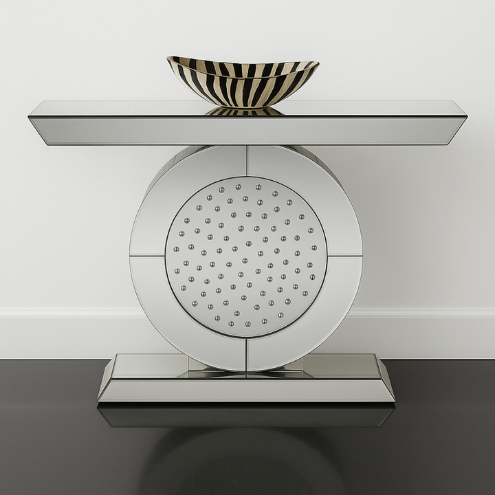 Decorative console table with a round mirror and a striped bowl on a white background