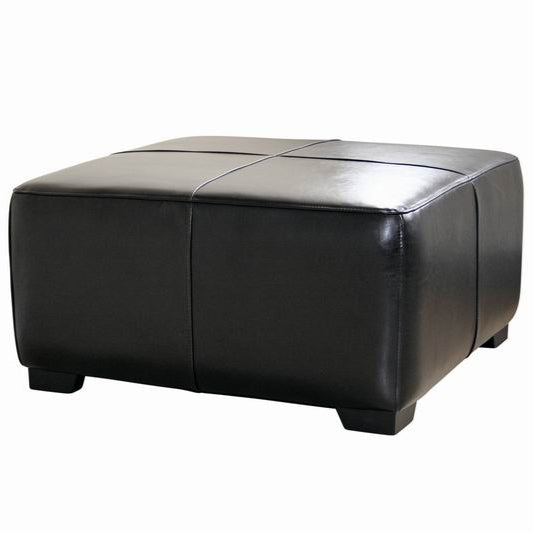 Black leather ottoman on a white background